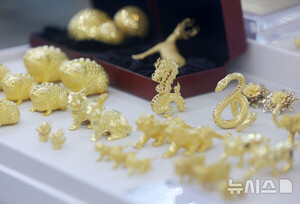 중국 은밀한 금 매입…국제 금값 고공행진 부추기나?